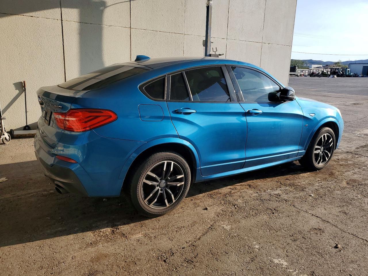 2017 BMW X4 XDRIVEM40I — Фото 3 из 12