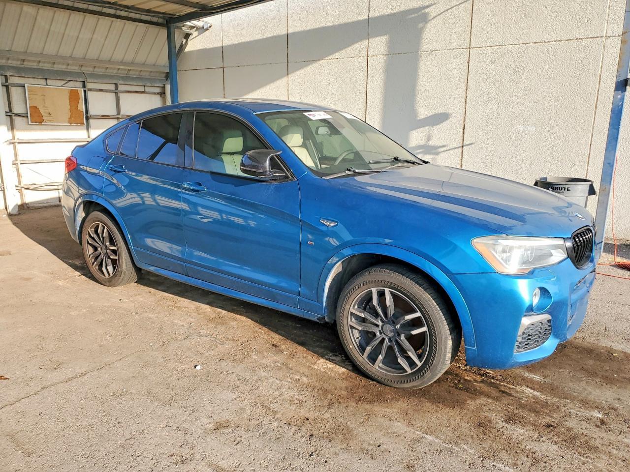 2017 BMW X4 XDRIVEM40I — Фото 4 из 12