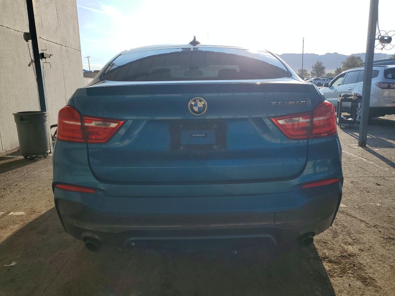 2017 BMW X4 XDRIVEM40I — Фото 6 из 12