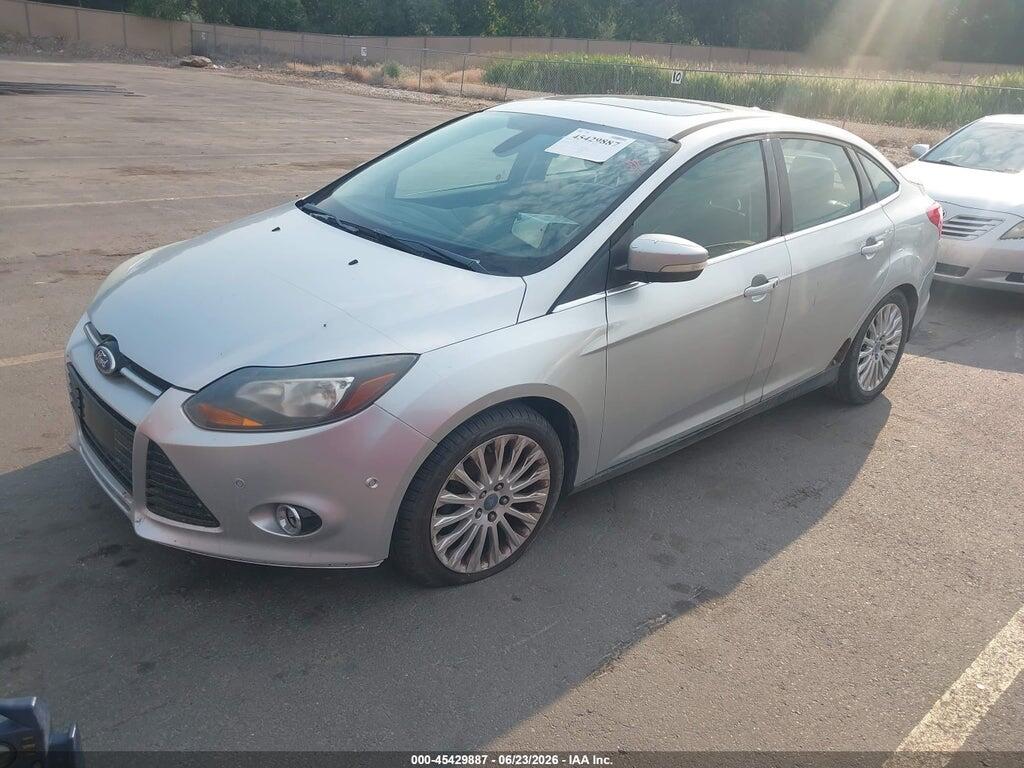 1FAHP3J21CL133049 2012 FORD FOCUS photo no. 2
