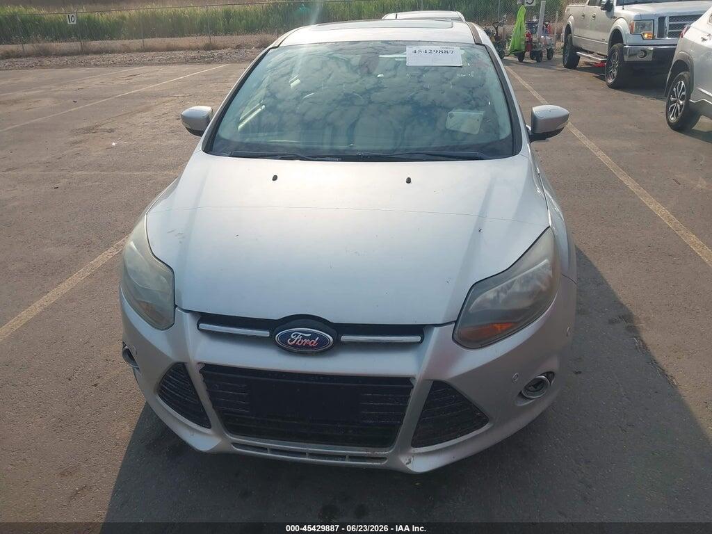 1FAHP3J21CL133049 2012 FORD FOCUS photo no. 6