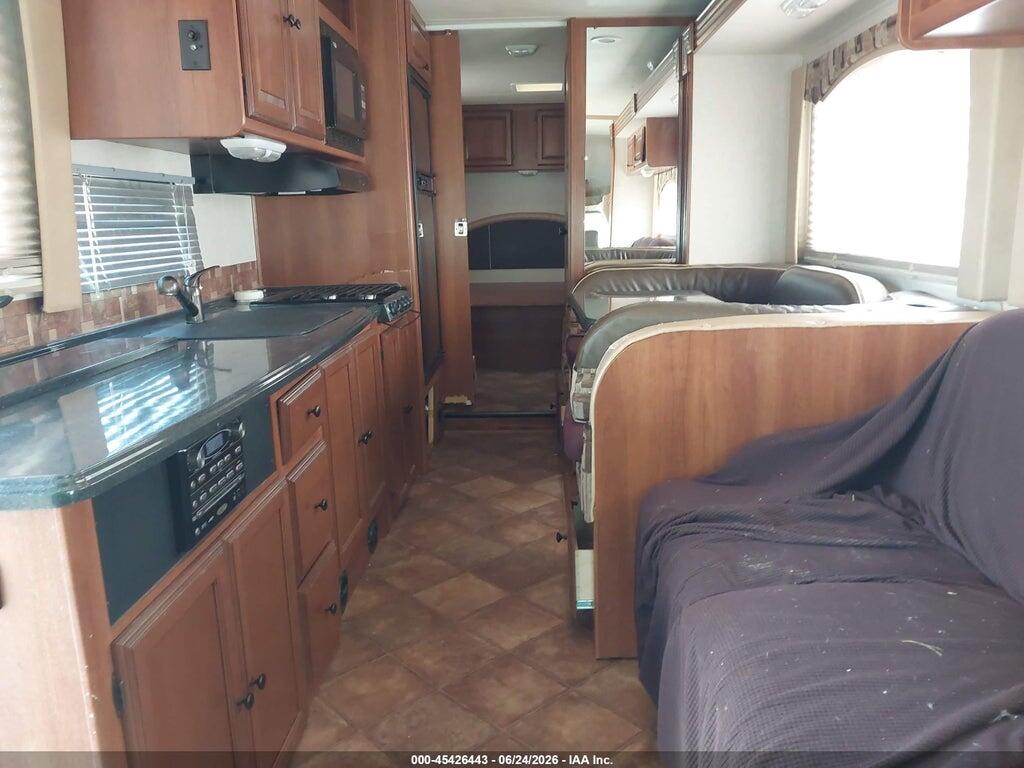 1FDXE4FS7CDA02532 2012 FORD E-450 CUTAWAY photo no. 7