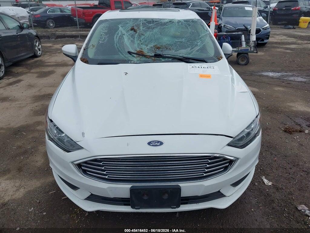 3FA6P0HDXJR223344 2018 FORD FUSION photo no. 12