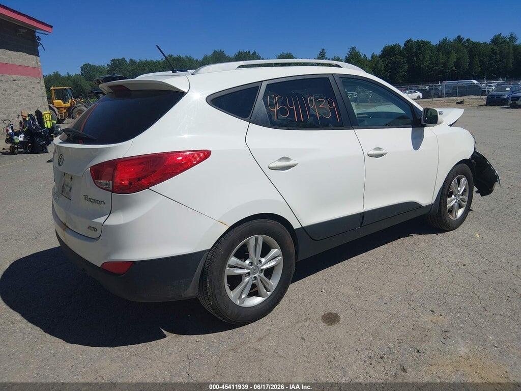 KM8JUCAC6CU415268 2012 HYUNDAI TUCSON photo no. 4