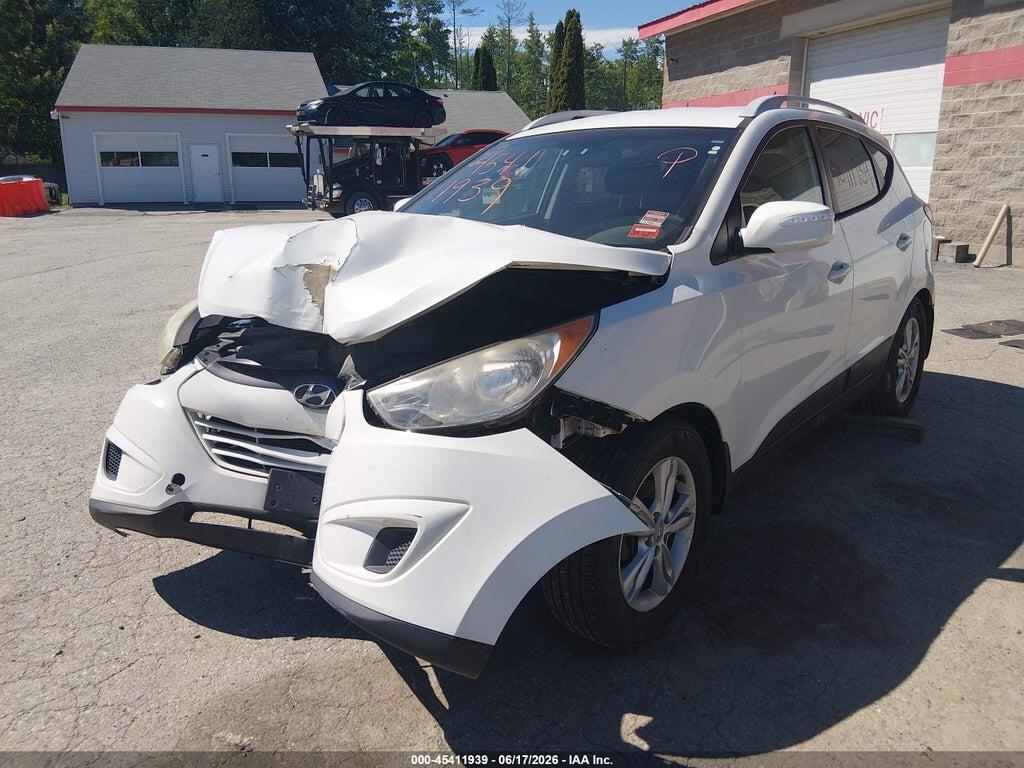 KM8JUCAC6CU415268 2012 HYUNDAI TUCSON photo no. 6