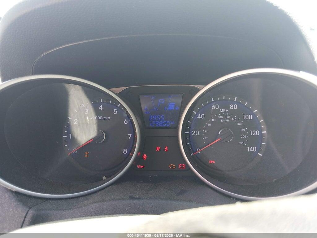 KM8JUCAC6CU415268 2012 HYUNDAI TUCSON photo no. 7