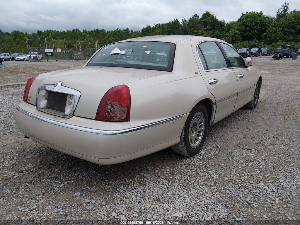 1LNHM83W5YY763355 2000 LINCOLN TOWN CAR photo no. 4