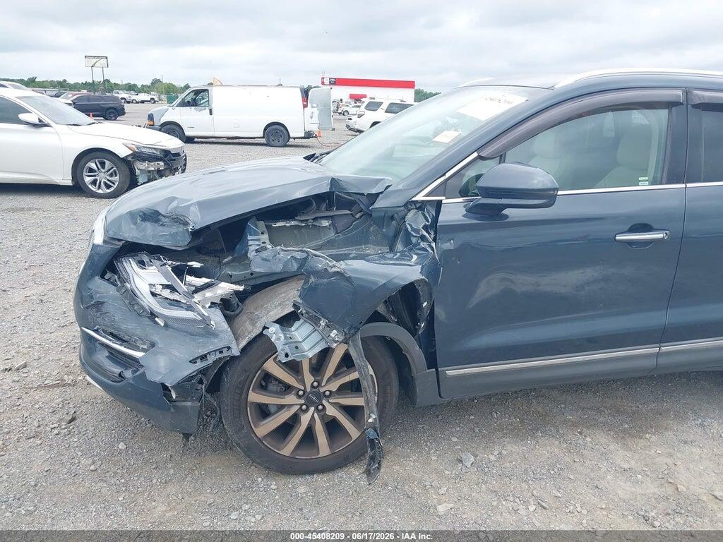 5LMCJ3C94KUL04135 2019 LINCOLN MKC photo no. 6