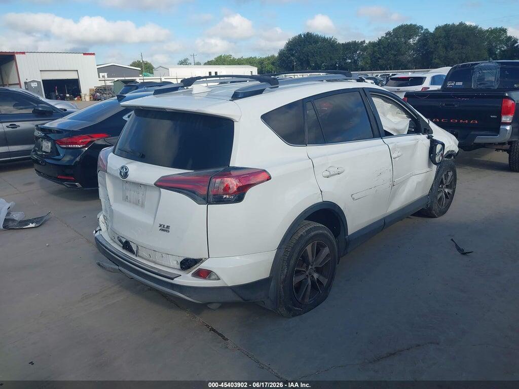 JTMRFREV7HJ121709 2017 TOYOTA RAV4 photo no. 4