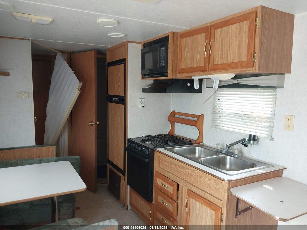 47CT80M29XM100004 1999 DUTCHMAN CLASSIC LE M-28BHL photo no. 8