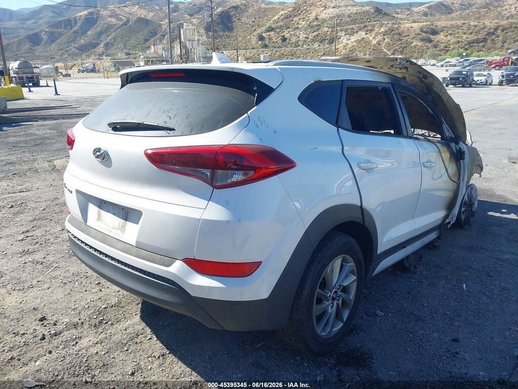 KM8J33A44HU562515 2017 HYUNDAI TUCSON photo no. 4