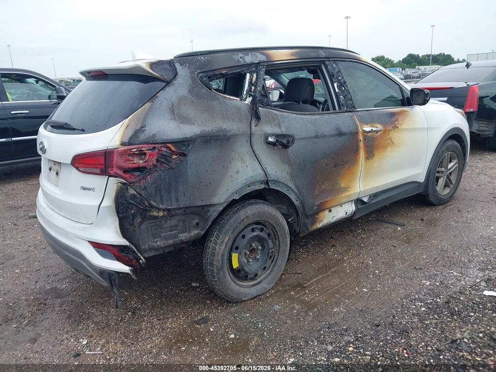 5NMZU3LB6JH101006 2018 HYUNDAI SANTA FE SPORT photo no. 4