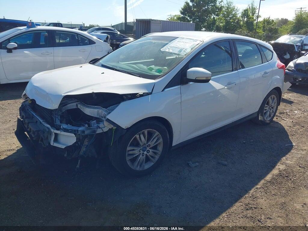 1FAHP3M22CL334180 2012 FORD FOCUS photo no. 2