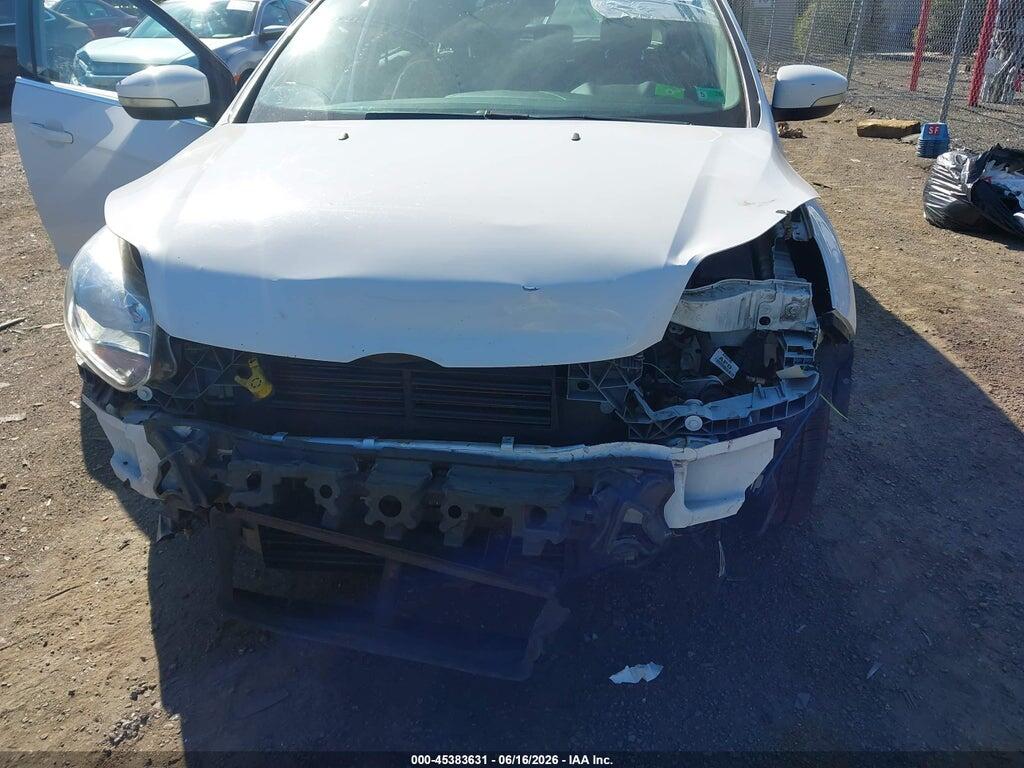 1FAHP3M22CL334180 2012 FORD FOCUS photo no. 6