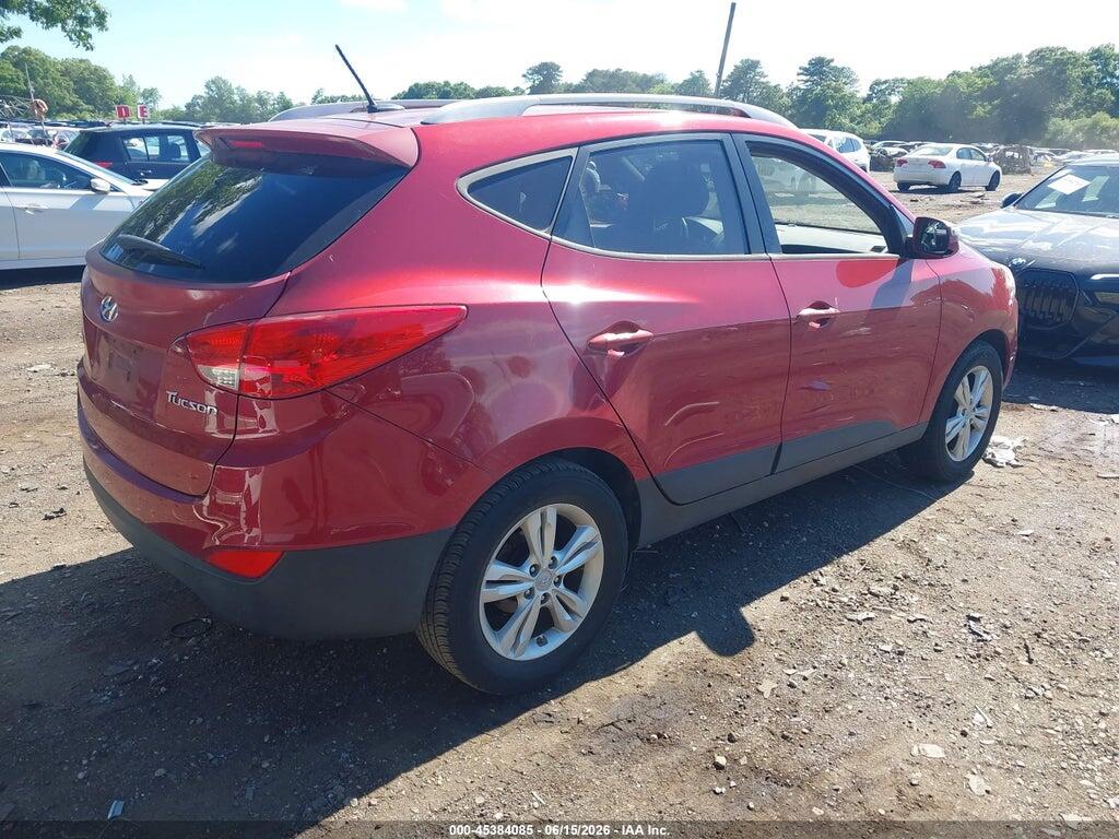 KM8JU3AC8CU494572 2012 HYUNDAI TUCSON photo no. 4
