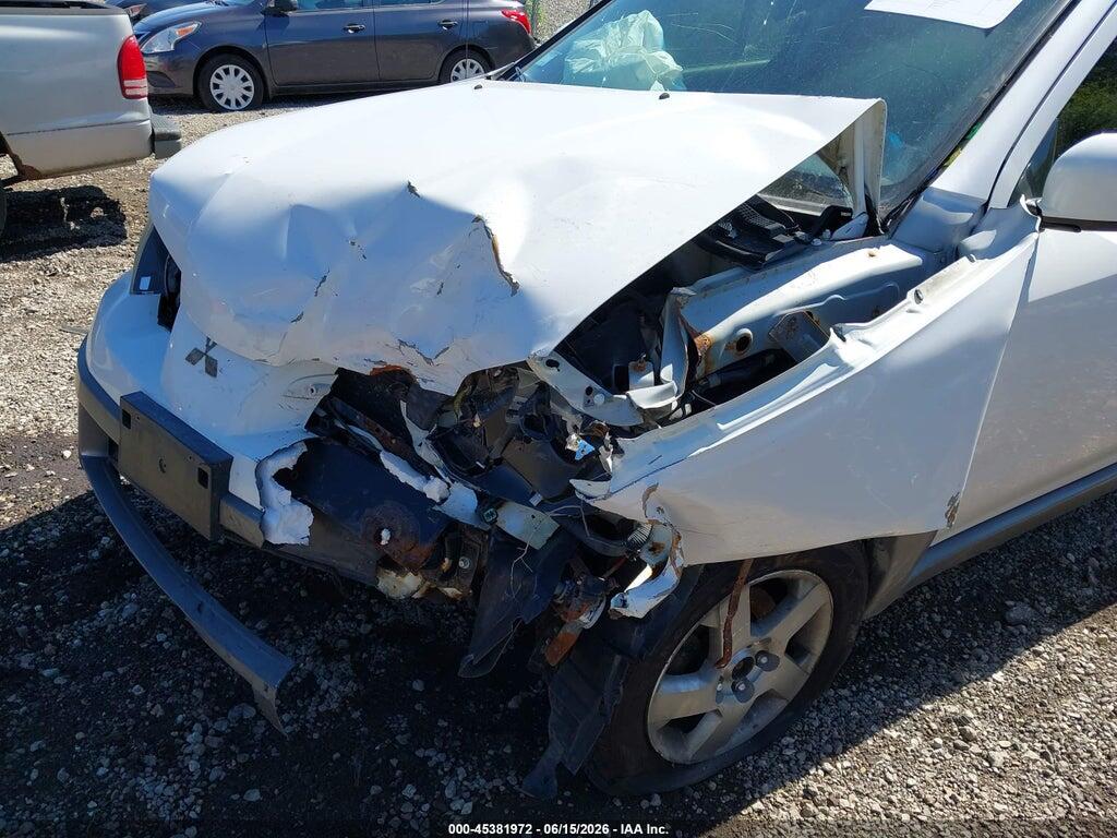JA4LZ41G33U025889 2003 MITSUBISHI OUTLANDER photo no. 6