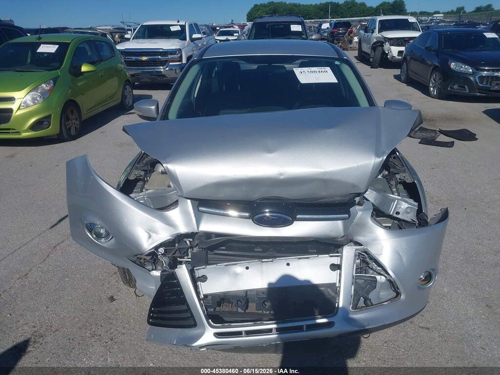 1FAHP3M21CL337832 2012 FORD FOCUS photo no. 11