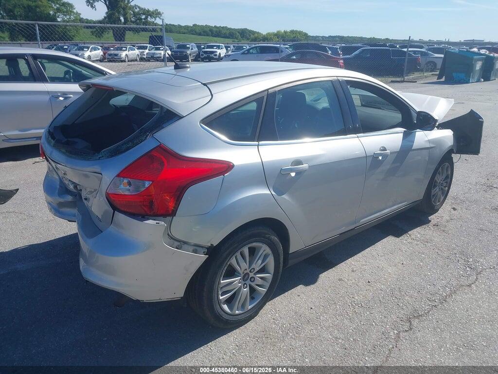 1FAHP3M21CL337832 2012 FORD FOCUS photo no. 4