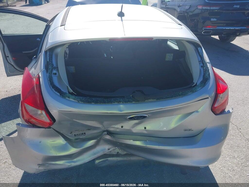1FAHP3M21CL337832 2012 FORD FOCUS photo no. 6