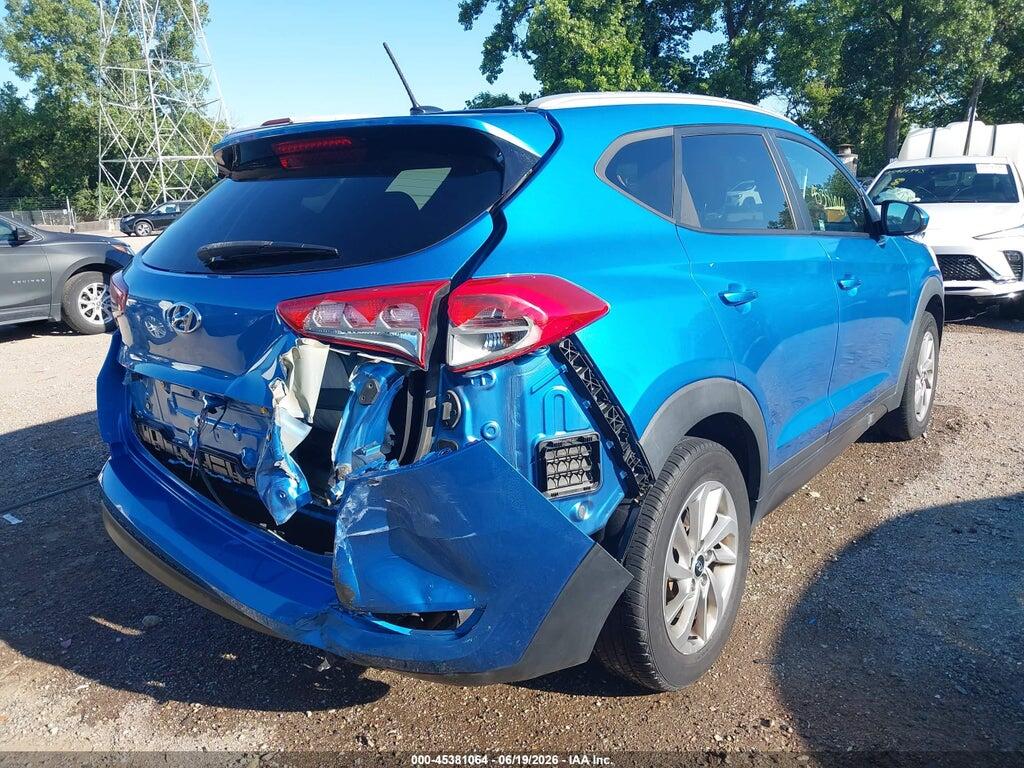 KM8J3CA44GU088760 2016 HYUNDAI TUCSON photo no. 4