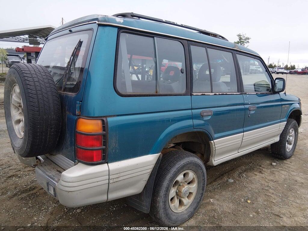 JA4MR41H0SJ014183 1995 MITSUBISHI MONTERO photo no. 4