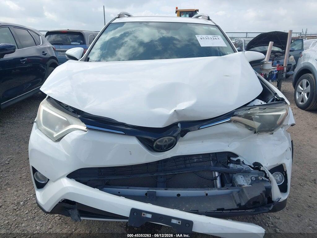 JTMRFREV0JJ746247 2018 TOYOTA RAV4 photo no. 12