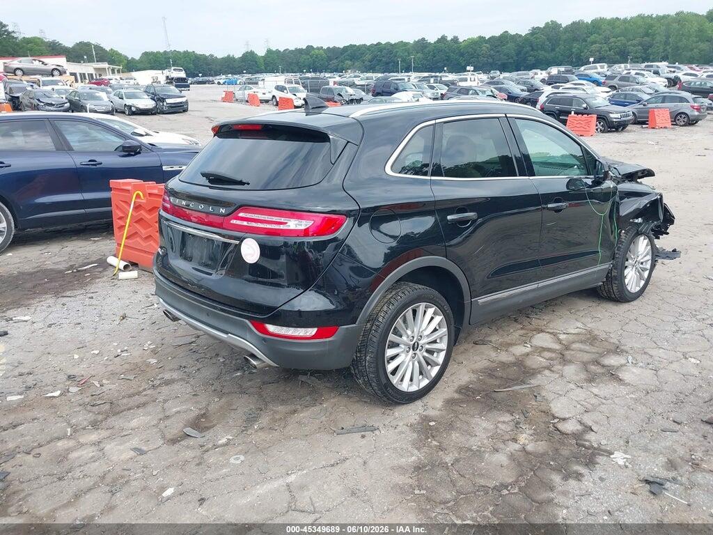5LMCJ1C90KUL43602 2019 LINCOLN MKC photo no. 4