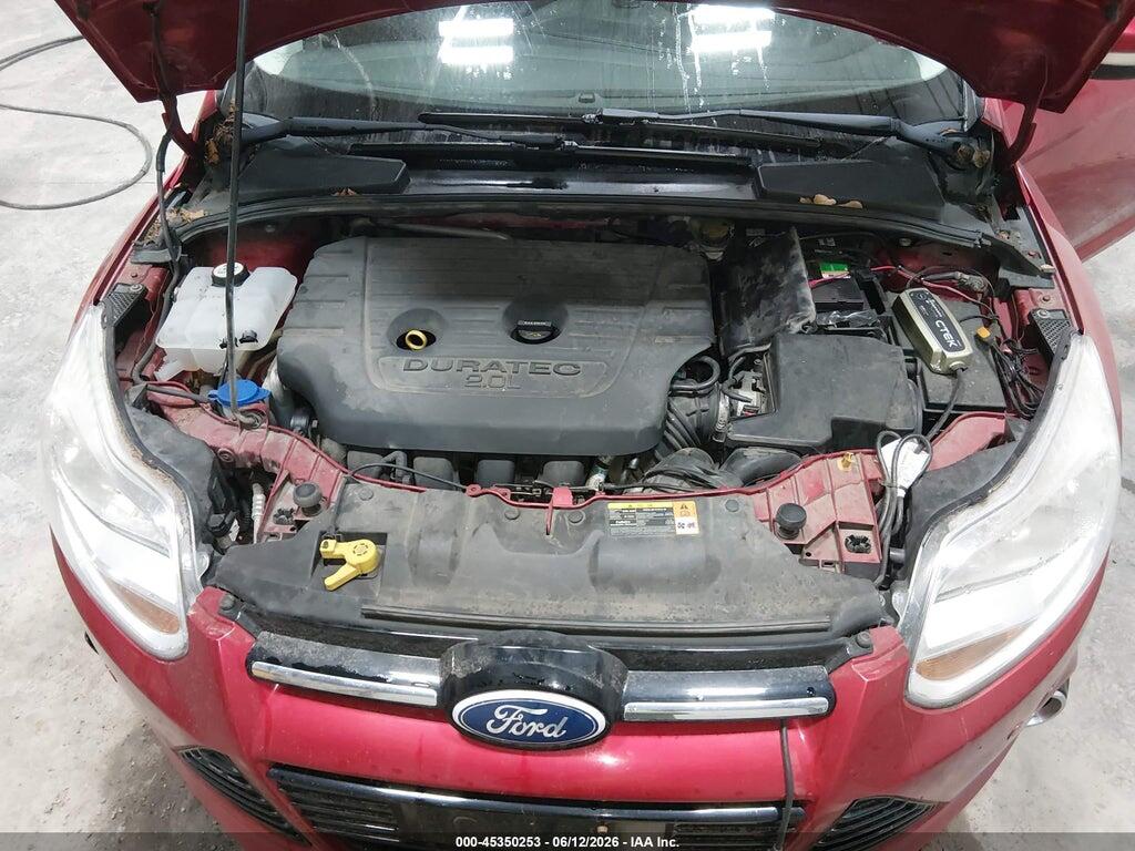 1FAHP3N27CL100213 2012 FORD FOCUS photo no. 10