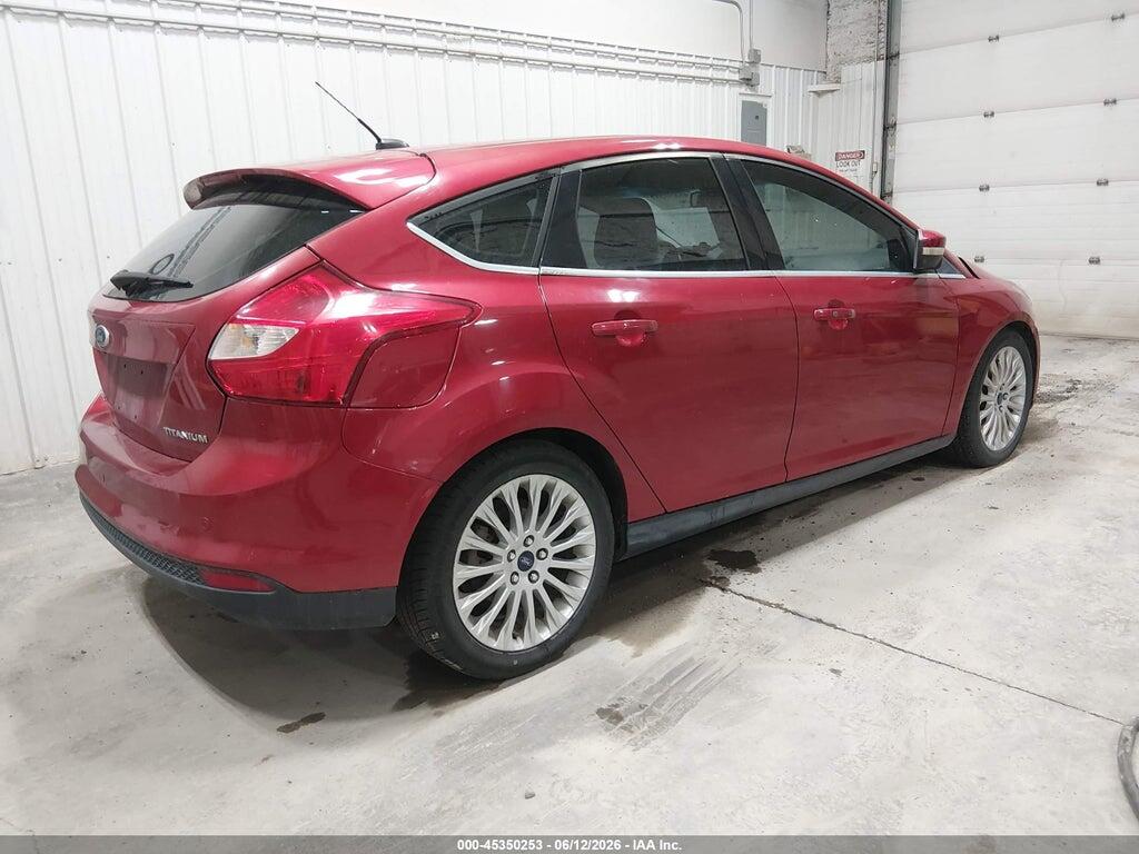 1FAHP3N27CL100213 2012 FORD FOCUS photo no. 4