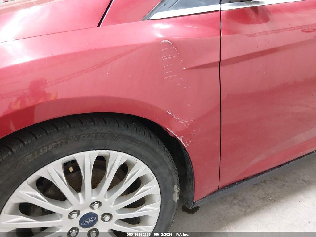 1FAHP3N27CL100213 2012 FORD FOCUS photo no. 6