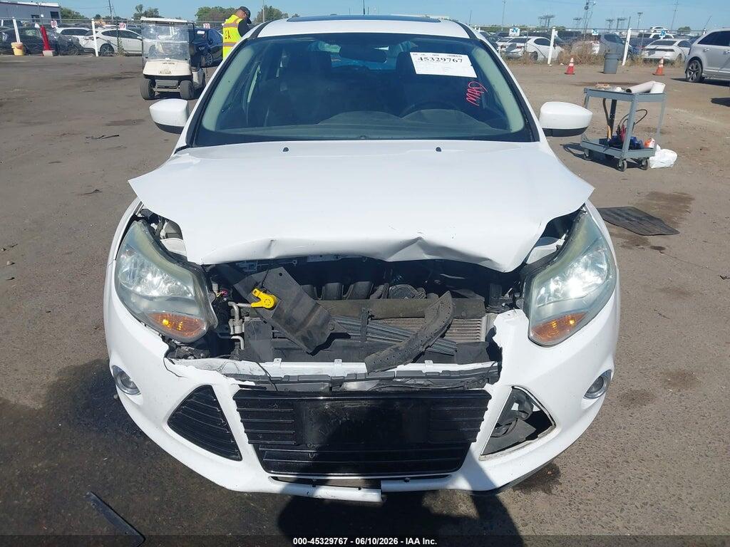 1FAHP3K21CL477737 2012 FORD FOCUS photo no. 12