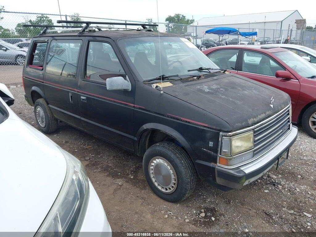 2P4FH4534LR561384 1990 PLYMOUTH VOYAGER photo no. 1