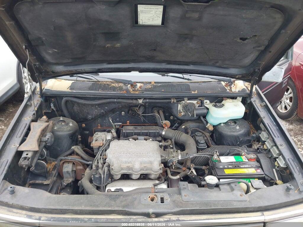 2P4FH4534LR561384 1990 PLYMOUTH VOYAGER photo no. 10