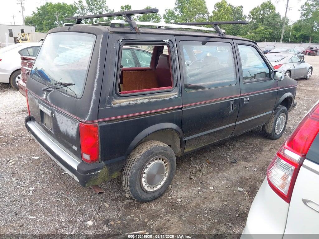 2P4FH4534LR561384 1990 PLYMOUTH VOYAGER photo no. 4