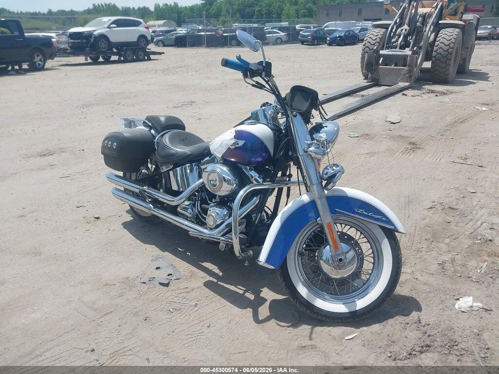 2010 HARLEY-DAVIDSON FLSTN 1HD1JD515AB042095