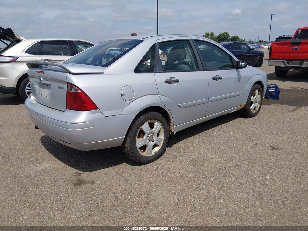 1FAHP34N96W233229 2006 FORD FOCUS photo no. 4