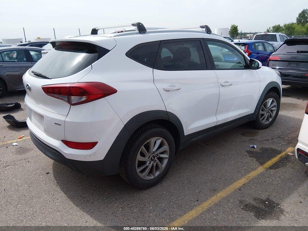 KM8J3CA40GU082759 2016 HYUNDAI TUCSON photo no. 4