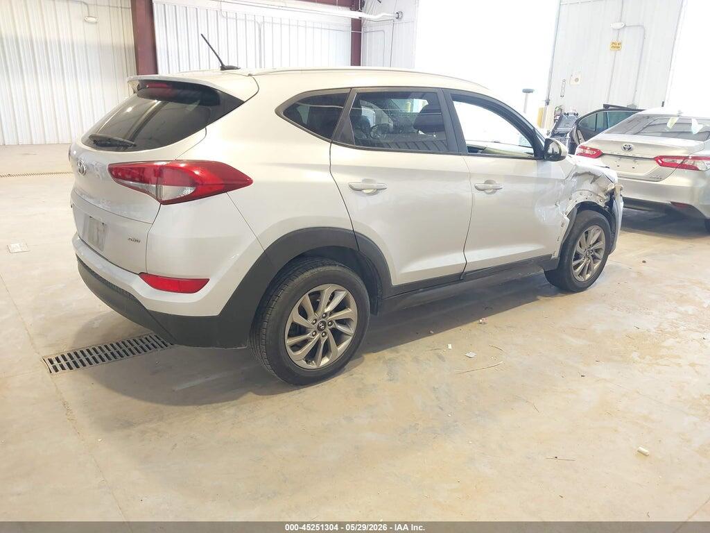 KM8J3CA45GU139893 2016 HYUNDAI TUCSON photo no. 4