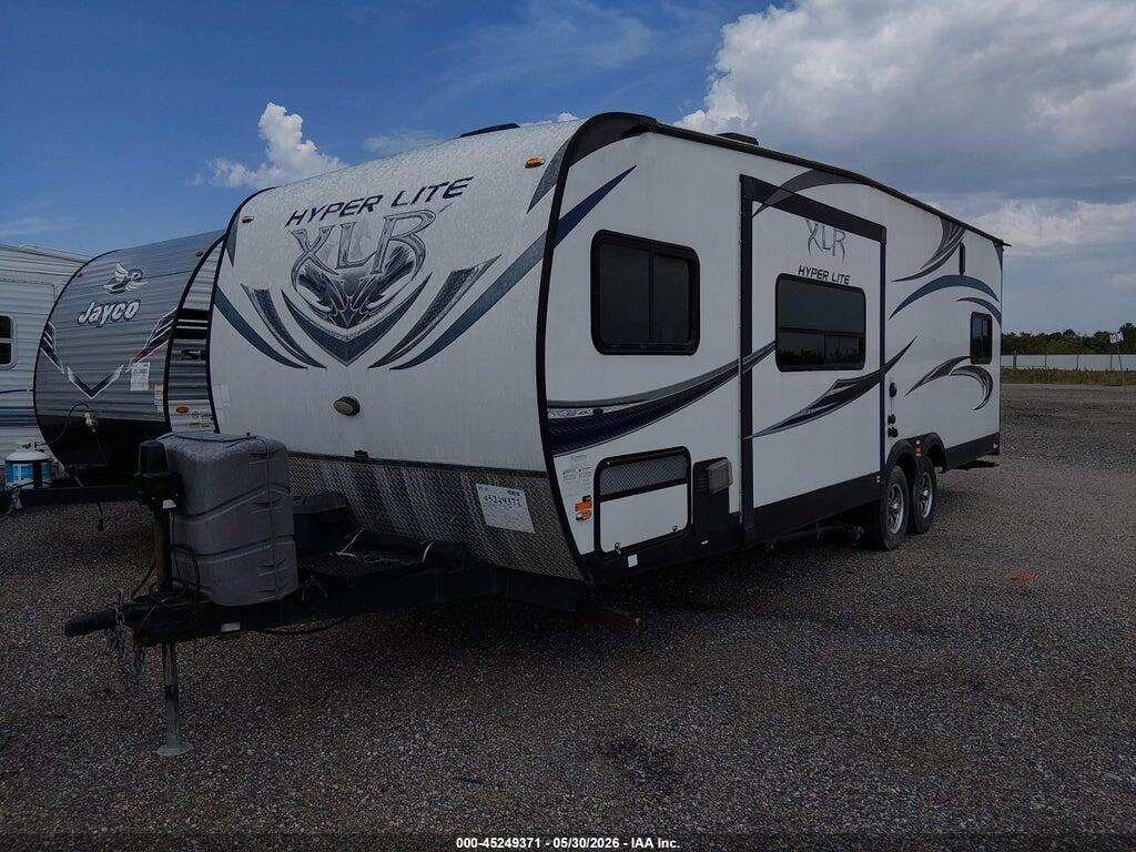 4X4TXLC29EF157418 2014 FOREST RIVER HYPER LITE XLT27HFS TOY HAULER TRAVEL TRAILER photo no. 2