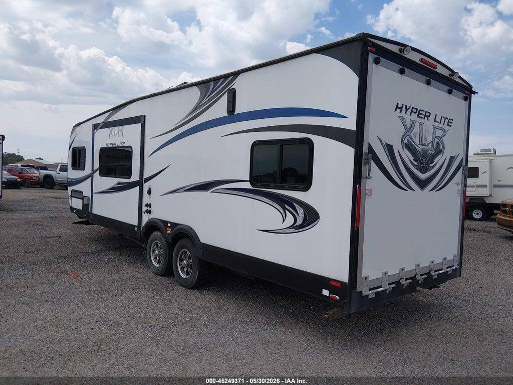 4X4TXLC29EF157418 2014 FOREST RIVER HYPER LITE XLT27HFS TOY HAULER TRAVEL TRAILER photo no. 3
