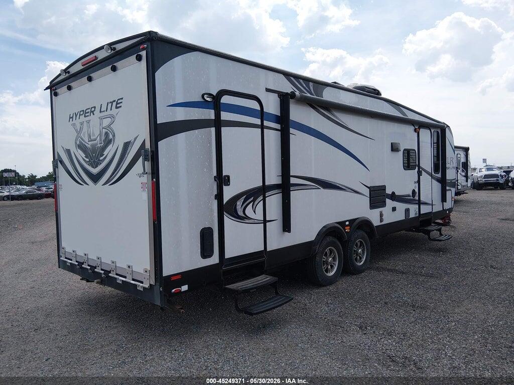 4X4TXLC29EF157418 2014 FOREST RIVER HYPER LITE XLT27HFS TOY HAULER TRAVEL TRAILER photo no. 4