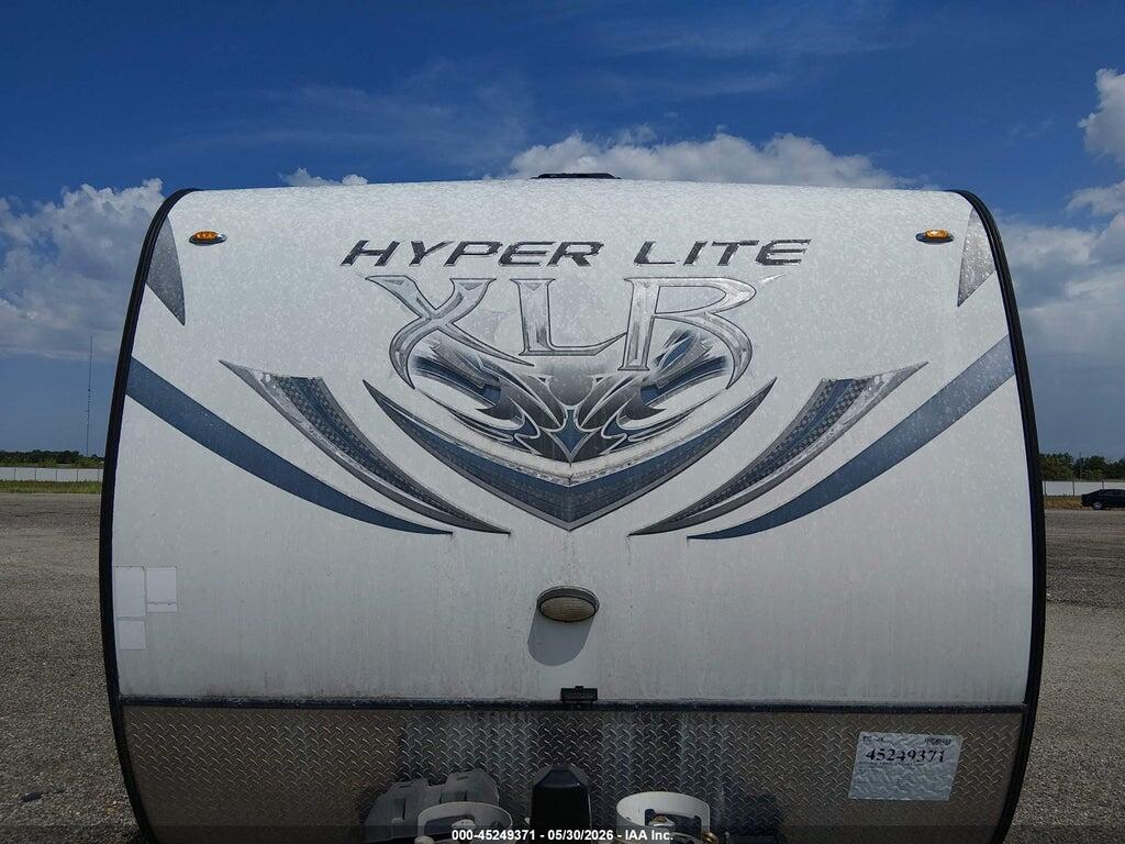 4X4TXLC29EF157418 2014 FOREST RIVER HYPER LITE XLT27HFS TOY HAULER TRAVEL TRAILER photo no. 6