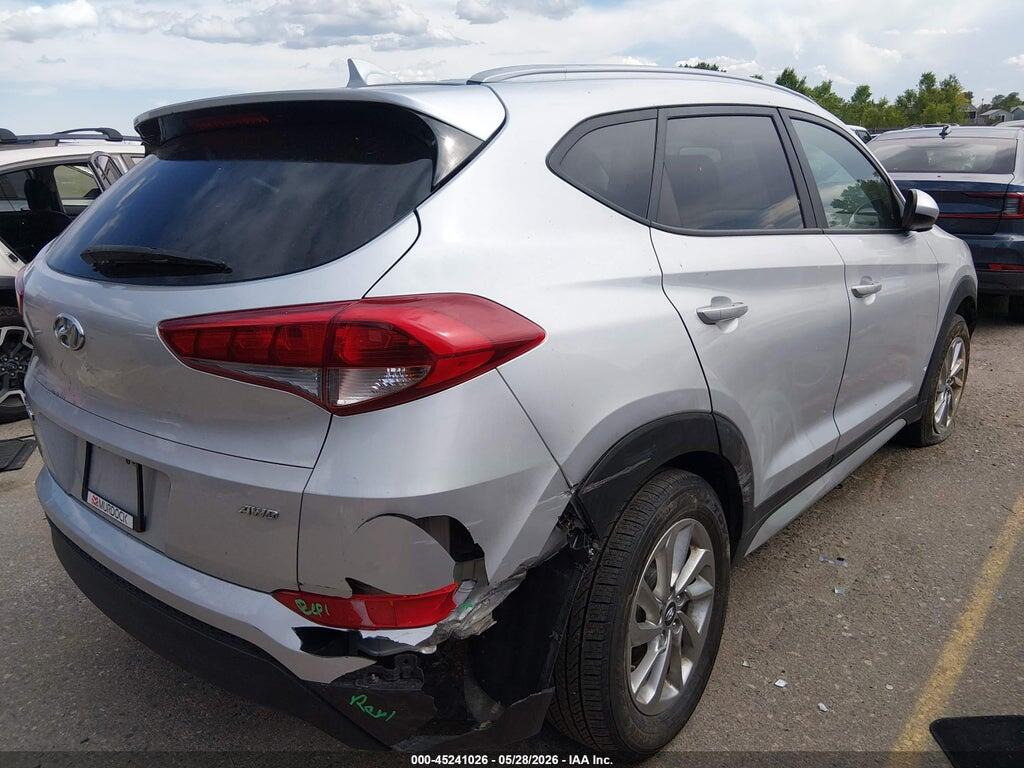 KM8J3CA42JU717259 2018 HYUNDAI TUCSON photo no. 4