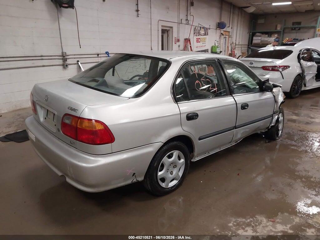 2HGEJ6576XH560009 1999 HONDA CIVIC photo no. 4