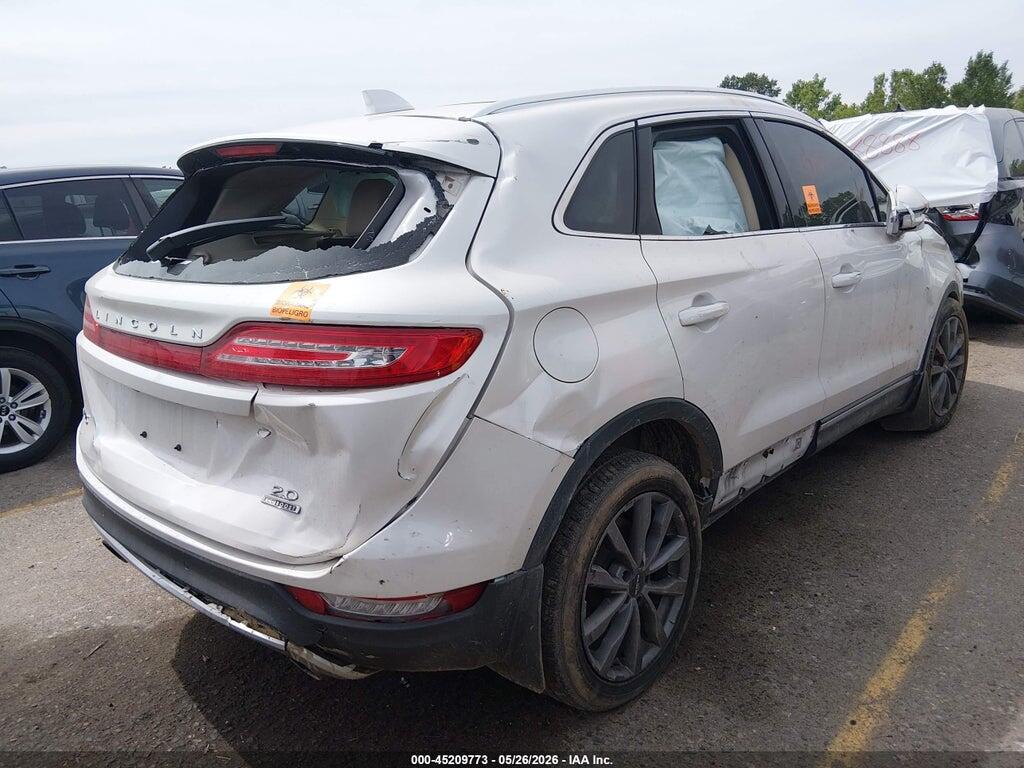 5LMCJ2C90GUJ19033 2016 LINCOLN MKC photo no. 4