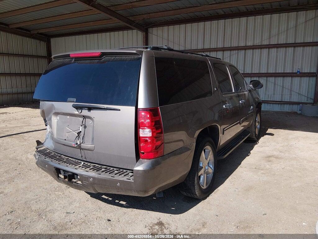 1GNSCJE09BR312631 2011 CHEVROLET SUBURBAN 1500 photo no. 4