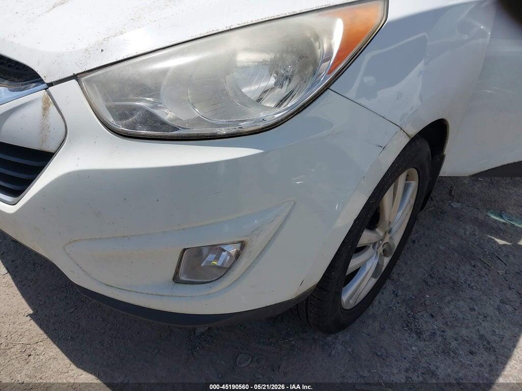 KM8JUCAC9CU537574 2012 HYUNDAI TUCSON photo no. 12