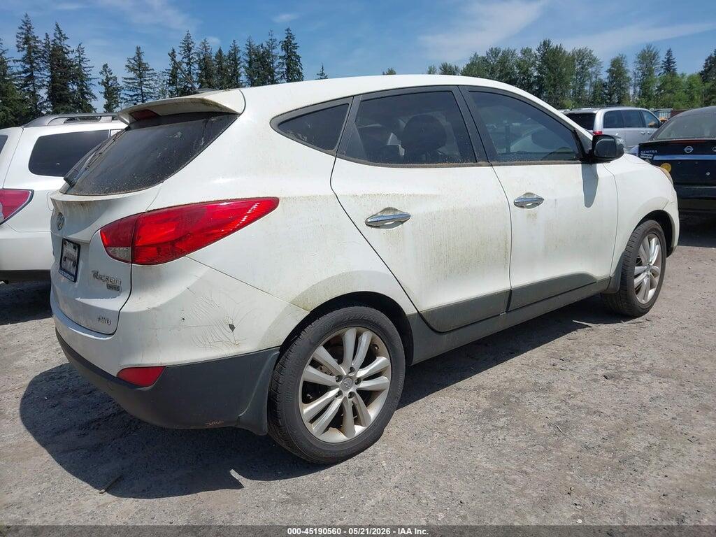 KM8JUCAC9CU537574 2012 HYUNDAI TUCSON photo no. 4