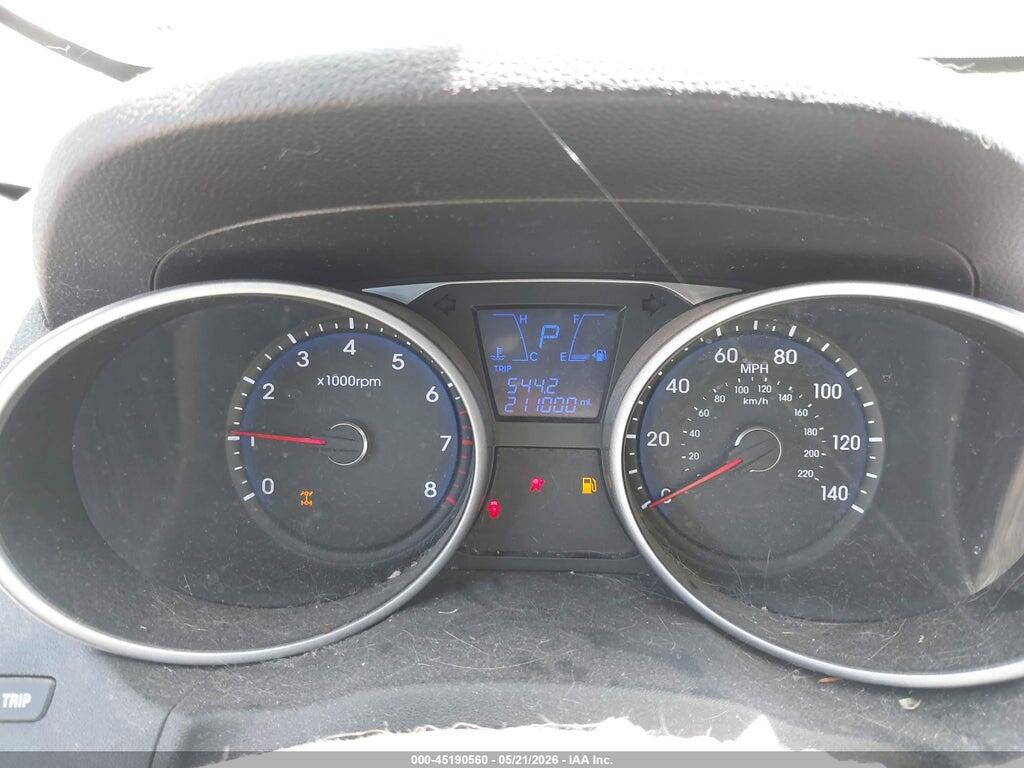 KM8JUCAC9CU537574 2012 HYUNDAI TUCSON photo no. 7