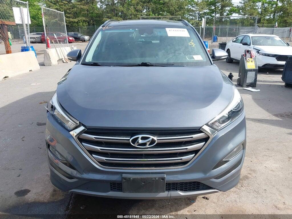 KM8J33A2XGU226185 2016 HYUNDAI TUCSON photo no. 12